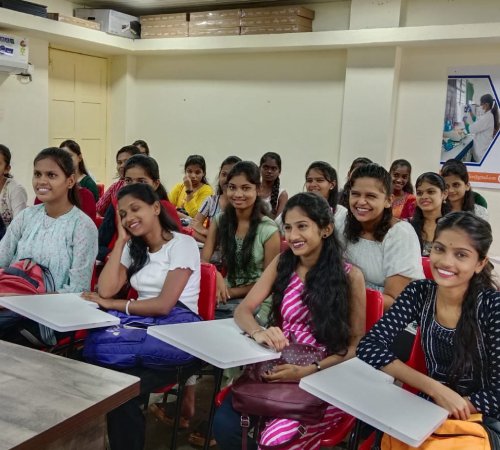 Smiling young women in allied-health training